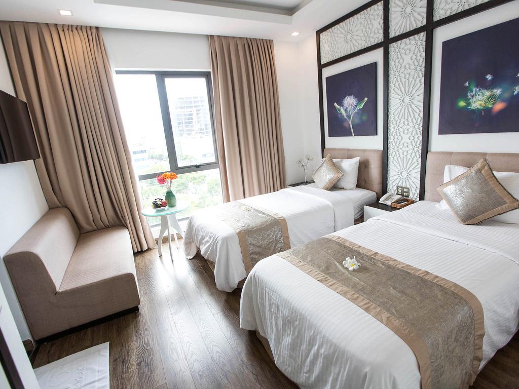Flora Hotel & Residence Дананг Экстерьер фото