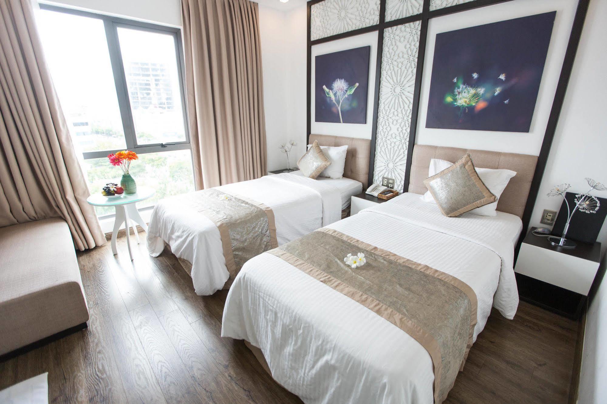 Flora Hotel & Residence Дананг Экстерьер фото